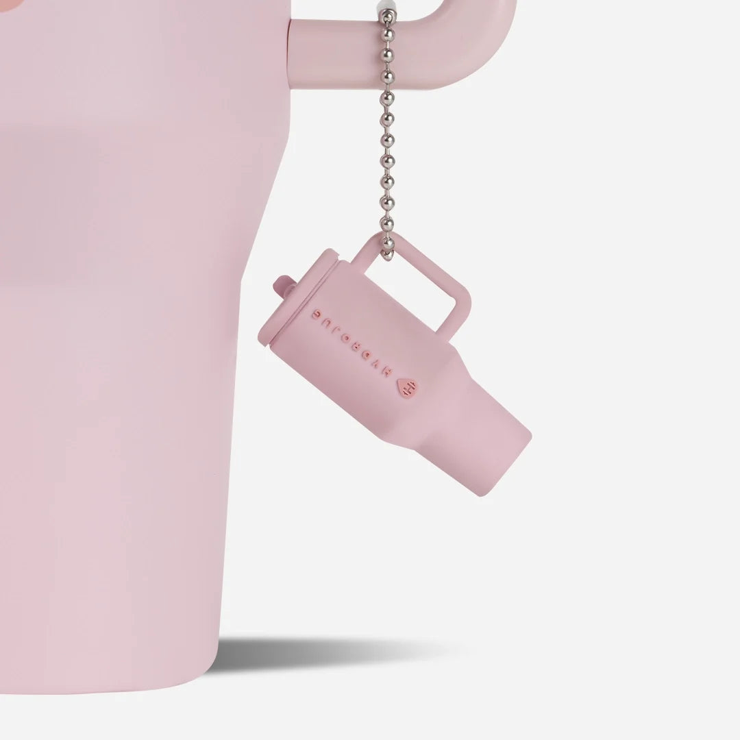 traveler-keychain-y4 Web-TravelerKeychainPhotos-PinkSand2.webp